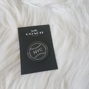 New Coach pin